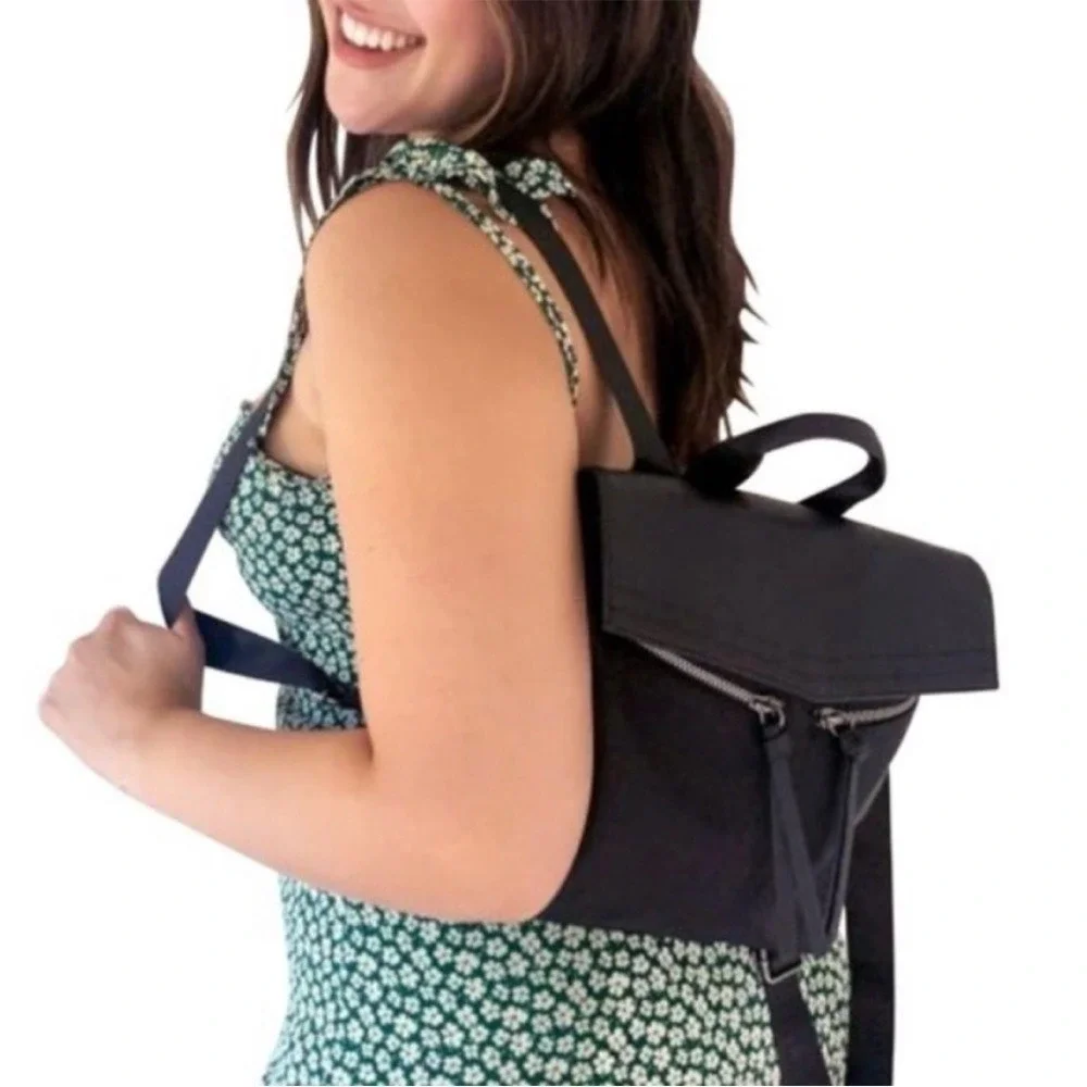 Botkier | Sleek Black‎ Mini Backpack Adjustable Branded Straps Tassel Pockets